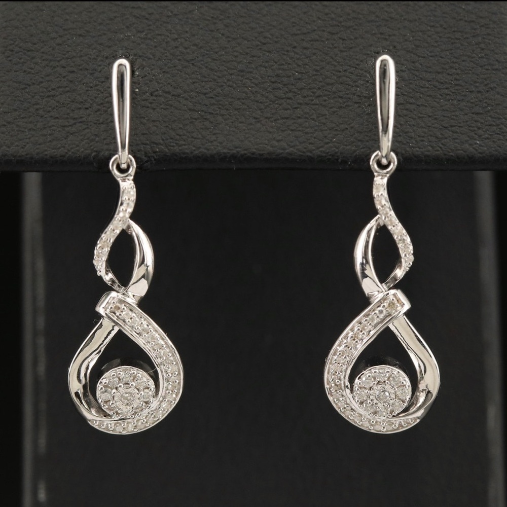 Sterling silver, diamond, drop earrings.